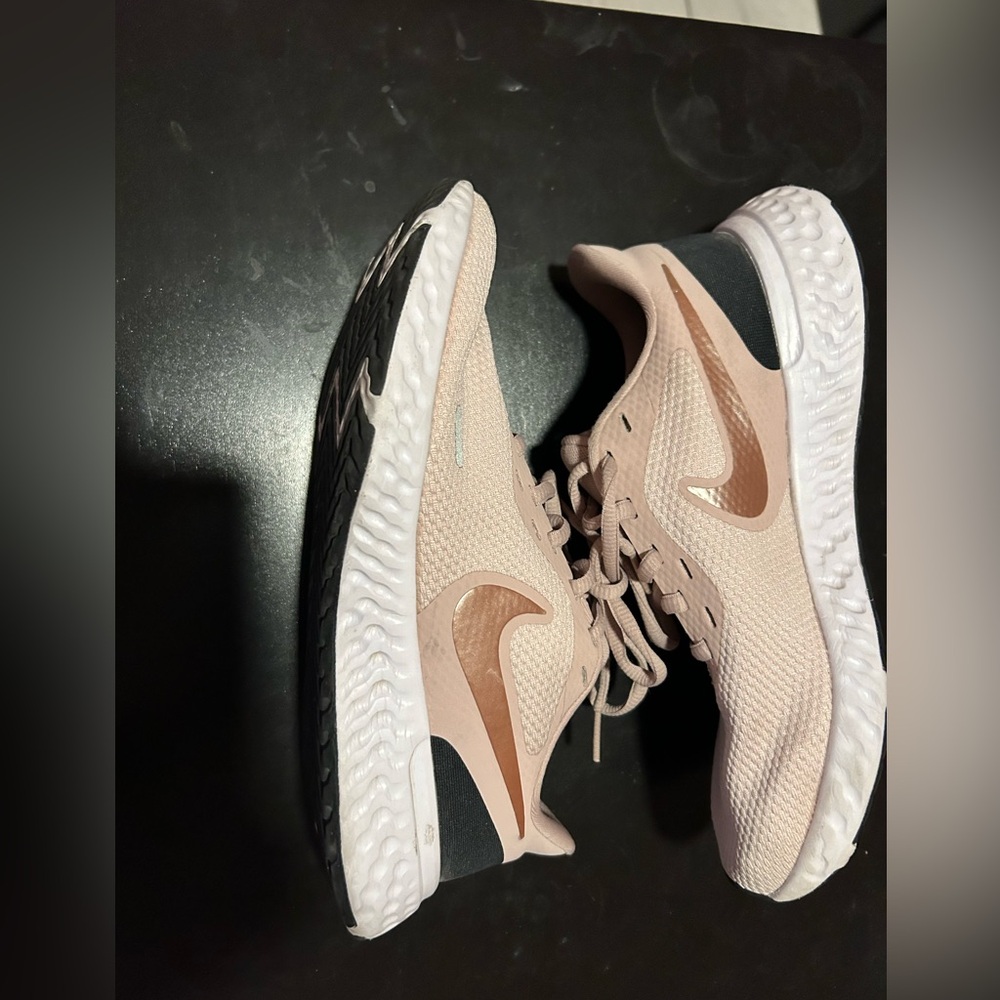 Pink Nike running shoes